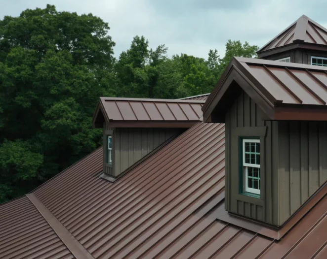 an angled view of the house showcasing a standing seam metal roof