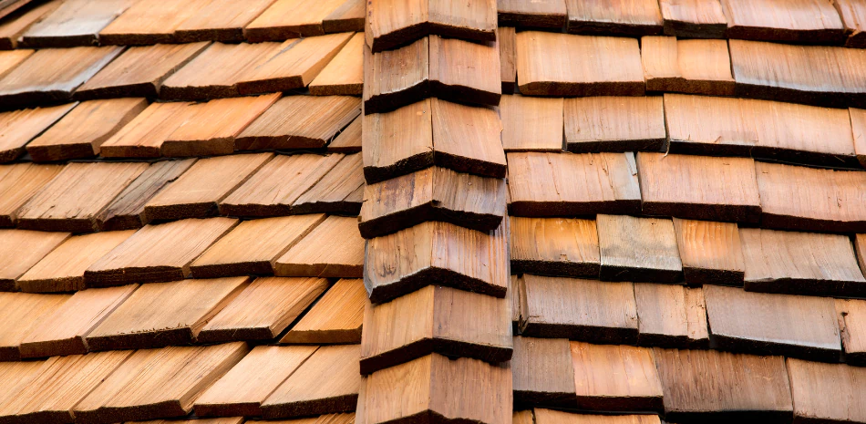an angular shot of the newly installed cedar roof shingles